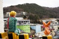 Little prince figure and fox statue at viewpoint with view landscape cityscape of Gamcheon Culture Hill Village or Santorini of