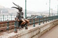 Little Princess landmark statue or Kiskiralylany sitting on the railings of the Danube promenade. Budapest, Hungary