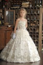 Little princess in white dress and red flowers Royalty Free Stock Photo