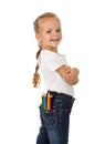 Little proud girl with pencils in her pocket