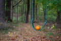 Little pumpkin on a swing Royalty Free Stock Photo