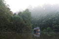 Little rafts lonely by lake with mist in the morning Royalty Free Stock Photo