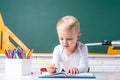 Little ready to study. Little children at school lesson. Kids gets ready for school.