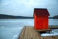 Little red boathouse on the dock Royalty Free Stock Photo