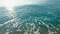 Fishermen in small boat trawling sardines and sea fish in ocean