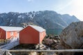 Little red cabins or rorbuer in Nusfjord, Lofoten in Norway during sunny nice weather.