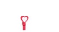 Little red clothespin heart. On white background. Love. Feeling of loneliness Royalty Free Stock Photo