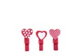 Little red clothespins hearts. On white background. Love Royalty Free Stock Photo