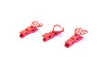 Little red clothespins hearts. On white background. Love Royalty Free Stock Photo