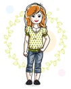 Little red-haired cute girl toddler in casual clothes standing o