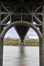 The Little Red Lighthouse under the gray bridge Royalty Free Stock Photo