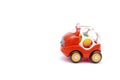 little red plastic car toy for newborn babies isolated, toys for children, kids development, playing Royalty Free Stock Photo