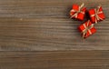 Little red presents on wood background christmas border Royalty Free Stock Photo