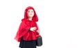 Little Red Riding Hood. Beautiful little girl in a red raincoat. Halloween Royalty Free Stock Photo