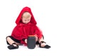 Little Red Riding Hood. Beautiful little girl in a red raincoat. Halloween Royalty Free Stock Photo