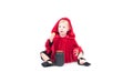 Little Red Riding Hood. Beautiful little girl in a red raincoat. Halloween Royalty Free Stock Photo