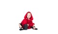 Little Red Riding Hood. Beautiful little girl in a red raincoat. Halloween Royalty Free Stock Photo