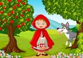 Little Red Riding Hood meeting with a wolf Royalty Free Stock Photo