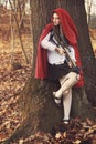 Little red riding hood waits her prey