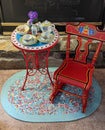 Little Red Rocking Chair and Tea Table Royalty Free Stock Photo