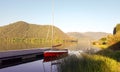 Little red sailboat at lago di Piediluco Italy