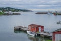 Little red shed & boat on a dock in Twillingate.