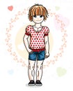 Little redhead cute child in wearing different casual clothes an