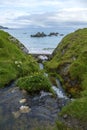 Little river flows into Sango Sands Bay at Durness