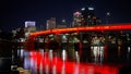 Little Rock Arkansas with its colorful bridges by night - LITTLE ROCK, UNITED STATES - NOVEMBER 05, 2022