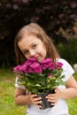 Little Russian Girl Hold Bouquet Purple Flowers Outdoor.