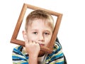 Little sad boy child framing his face Royalty Free Stock Photo