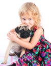 Little sad girl hugging dog isolated on white