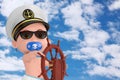 Little Sailor or Captain Concept. Cartoon Cute Baby Boy in Naval Officer, Admiral, Navy Ship Captain Hat near Wooden Ship Steering