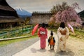 Little samurai boy with sword and Two Kimono Japanese women