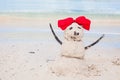 Little sandy snowman with bow on white Caribbean Royalty Free Stock Photo