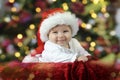 Little santa baby with christmas hat Royalty Free Stock Photo