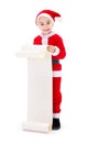 Little Santa Claus boy showing wishlist