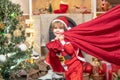 Little Santa huge bag run to delivery christmas gift. Santa helper with a huge bag. Santa helper carrying sack full of Royalty Free Stock Photo