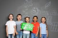 Little school children with placard SAVE EARTH Royalty Free Stock Photo