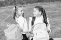 Little school friends girls with backpacks, conversation with friend concept Royalty Free Stock Photo