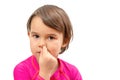 little school girl picking her nose, bad habits of children Royalty Free Stock Photo