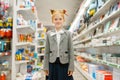 Little school girl in stationery store Royalty Free Stock Photo