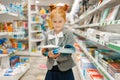 Little school girl in stationery store Royalty Free Stock Photo