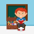 Little schoolboy with chalkboard