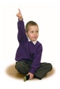 Little schoolboy, hand up - got an idea, eureka Royalty Free Stock Photo