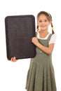 Little schoolgirl with empty vertical chalkboard Royalty Free Stock Photo