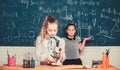 Little scientist work with microscope. Little girls in school lab. Microscope. Testing your blood. Children using Royalty Free Stock Photo