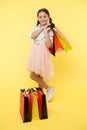 Little shopper. little shopper or shopaholic. little girl shopper with shopping bags. go shopping with little shopper.