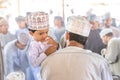 Little shy boy leaning against the shoulder of his father. Royalty Free Stock Photo