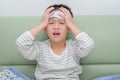 Little sick boy with headache Royalty Free Stock Photo